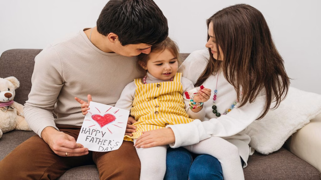 Husband Receiving Heartfelt Father’s Day Wishes Futurecept | Blogs a Wife Giving Her Husband a Thoughtful Father’s Day Wish and Card